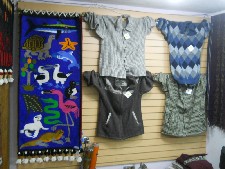 Wandteppich mit Galapagos-Tieren und
                              Pullis