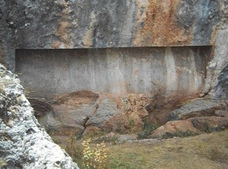 Cusco-Sacsayhuamn: Zone X (Laq'o,
                        Laco, Temple of the Moon): giant curbed cut in
                        the rock
